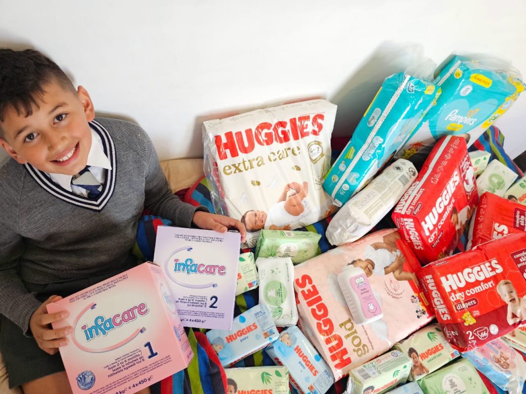 Zach with Baby goods